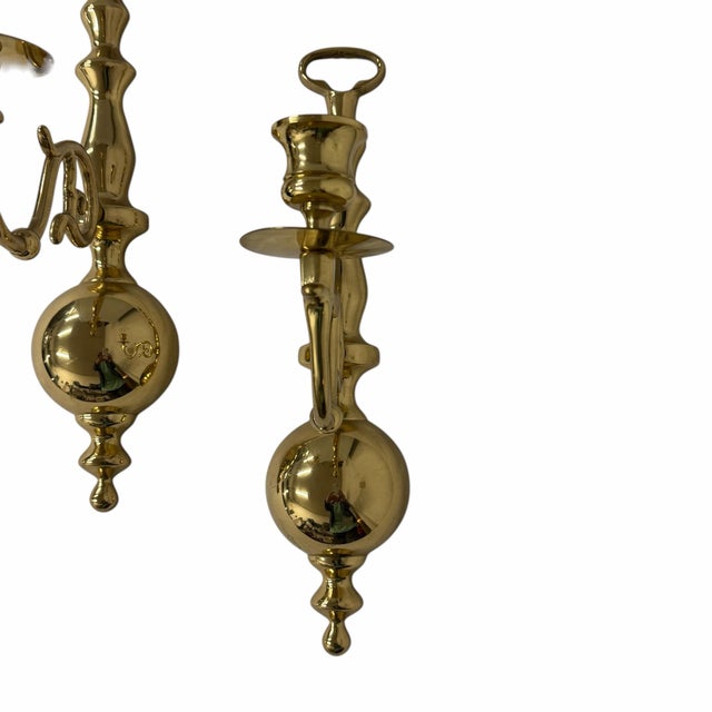 Offered these vintage brass wall candle sconces, in colonial, Georgian, mid-century styles. Material: Solid brass with a...
