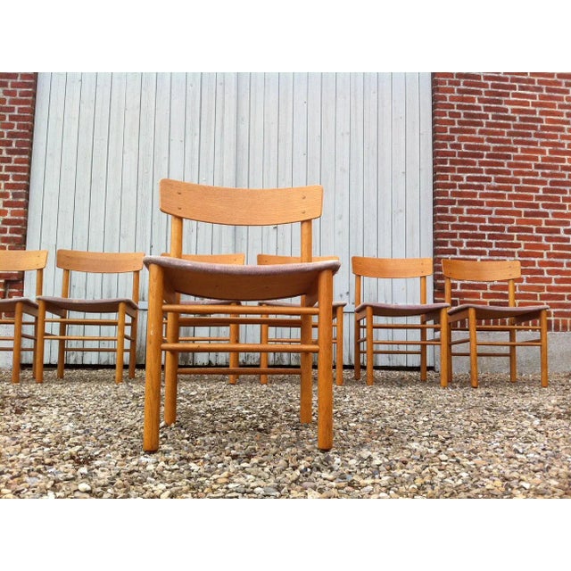 These chairs are similar to Børge Mogensen's J39 but are by Farstrup, another Danish maker. They were manufactured in the...