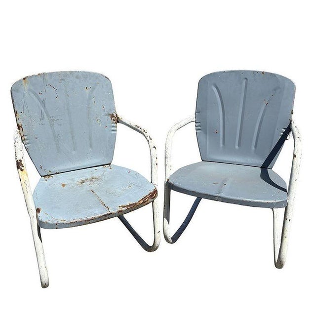 Steel Mid-century Springer Outdoor grey enamel Lounge Chair Set of Two. Each chair features a white round tubular U-shaped...
