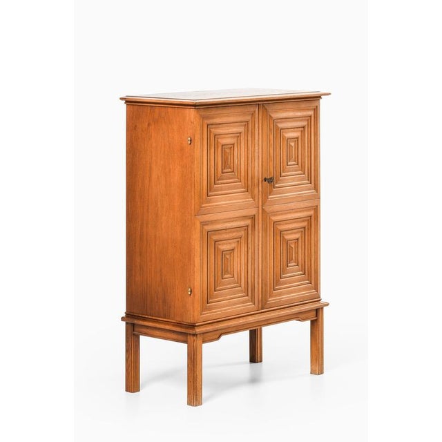 Cabinet in oak and brass by oscar nilsson, 1940's additional information: material: oak and brass style: mid century,...