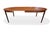 A very beautiful and stylish teak dining table with a lovely rich colour tone, manufactured by the Danish company C.J....
