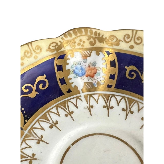 Allerton china saucer. Navy with gilt and florals. Stamp on reverse.