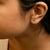 Expertly crafted to symbolize individuality and grace, this exquisite "A" initial stud earring is fashioned from radiant...