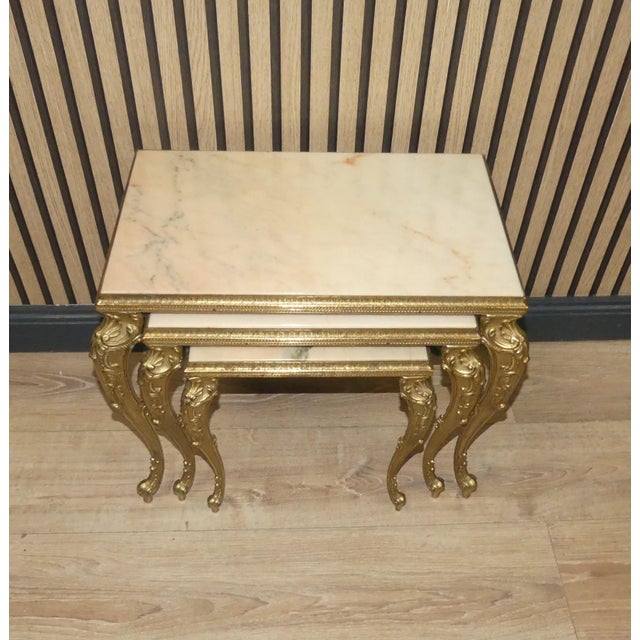 Beautifully designed, elegant side tables Nesting table set Beautifully grained marble (onyx) with a decorative cast brass...