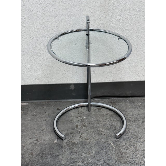 Design Plus Gallery presents an Eileen Grey Style Chrome + Glass Side Table by Alivar. An iconic modern accent table...