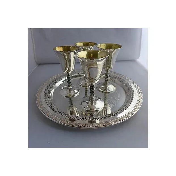 5-Piece silver-plated ensemble wine service consisting of four twisted-stem wines and one round tray. Maker's mark reads...