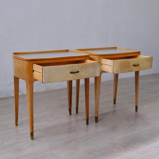 Beautiful pair of bedside tables designed in the original 1950s, attributable to Paola Buffa. Elegantly shaped structure...
