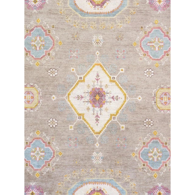 Khotan hand-knotted rugs are quite unique folk artifacts which display elements of rich, historical cultures. These rugs...