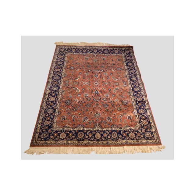 This refined vintage rug embodies the elegance of classic Oriental motifs, perfect for adding warmth and character to any...