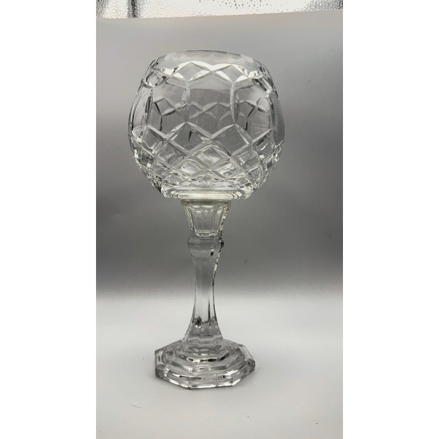 Stunning, heavy-weight vintage candle holder crafted from genuine 24% lead crystal. This piece features an elegant goblet-...