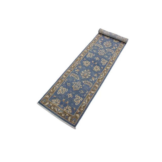 A Persian influenced Turkish hand knotted rug made by skilled artisans capable of creating the most exceptional vegetable...