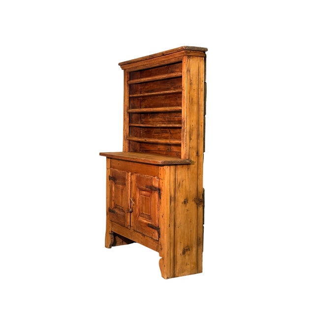 A rare 19th-century fir wood dresser, a unique piece featuring two doors at the bottom and a plate rack at the top. Solid...