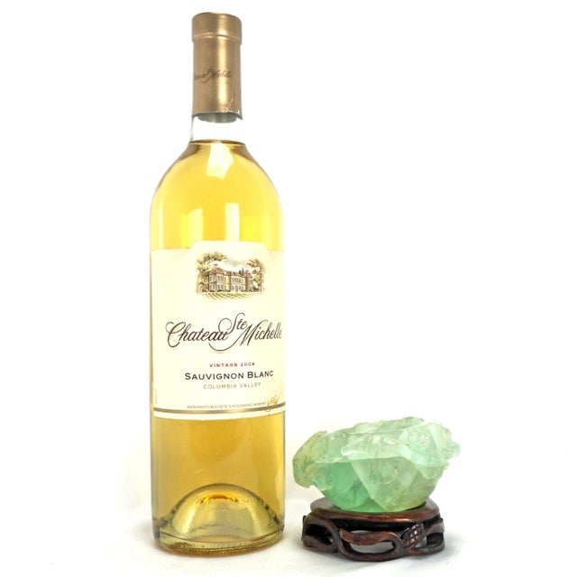 A colorful carved fluorite stone brush washer or censer that had a hand carved stand made for it. The stone looks like...