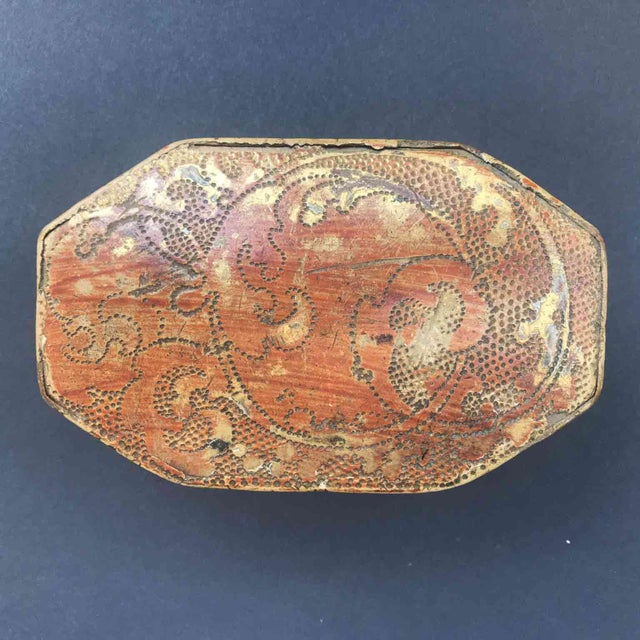 Antique gilded and engraved box made of white walnut, octagonal in shape, gilded on the rim and lid, and decorated with...