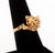 18K Yellow Gold Ruby Diamond Emerald Leopard Ring, featuring thirty six pave set rubies weighing a total of approx. 0.60...