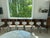 This set of 6 Vintage Donghia "Anziano" brown leather chairs is a great showcase for this iconic minimalist chair's...