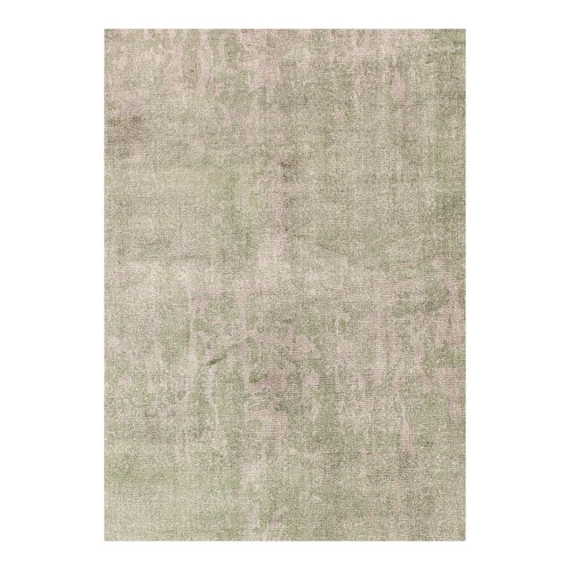 Enjoy the rich and luxurious feeling of bamboo silk underfoot with this area rug. The hand-knotted construction withstands...
