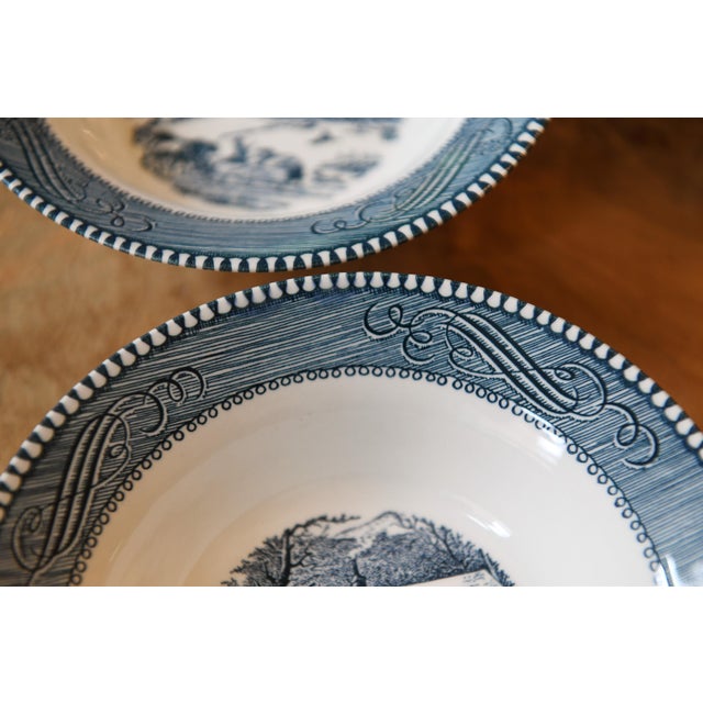 Blue and white transferware bowls that were part of a larger collection of vintage china gathered to be used by artist...