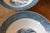 Blue and white transferware bowls that were part of a larger collection of vintage china gathered to be used by artist...