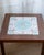 These vintage Danish rosewood side tables feature beautiful ceramic tile inlays—both decorative and practical. The rich...