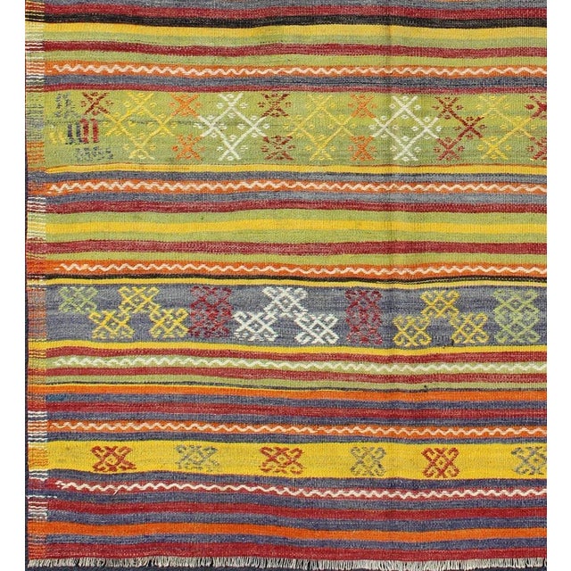 Vintage Turkish Kilim Rug in Yellow, Red, Green, and Blue With Tribal Motifs For Sale - Image 4 of 13