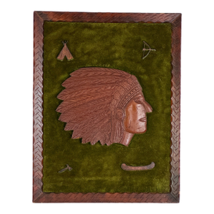 Early 20th Century Framed Wood Carved Native American Wall Collage Against Rug Backdrop