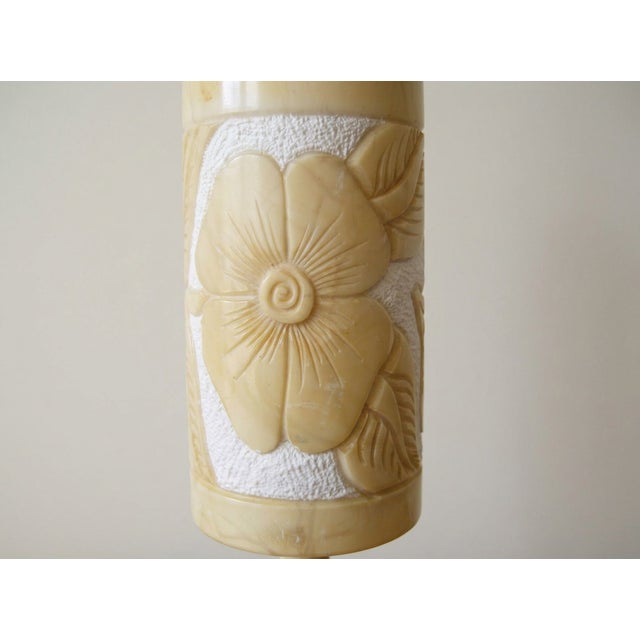 A fantastic piece of decoration, hand-carved from a solid block of alabaster, elegantly ornamented with a floral theme. In...