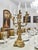 A beautiful pair of heavy cast brass candlesticks represents the pinnacle of elegance and craftsmanship. Richly decorated...