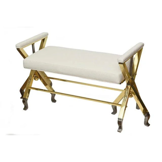 This most unusual and interesting vintage Mid-Century Modern comfortable 3-legged bench is a combination of polished brass...