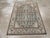 A wool pile of symmetric knots on a cotton foundation. We admire Malayer scatters, and this one features a slate grey...