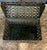 Striking vintage metal chest featuring an intricate pierced lattice design and dramatic domed lid. The repeating...
