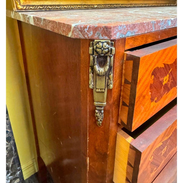 Grace your home with the timeless beauty of this French Louis XV Commode, a refined piece that blends elegant...