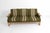 A solid and well-made mid-century (circa 1960's) paddle arm type sofa. The sofa has a solid oak wood carved/figured frame...