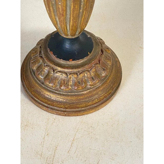 This candle holder or Candlestick is in Wood with a gold color. It is heavy, and in a very good condition. The patina is...
