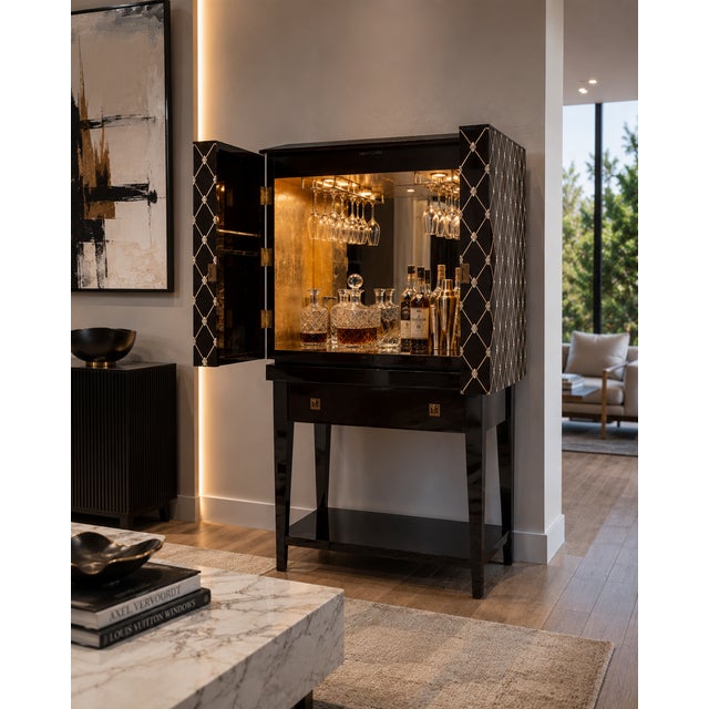 A striking Century Furniture Prink Bar Cabinet that beautifully blends Hollywood Regency glamour with Art Deco Revival...