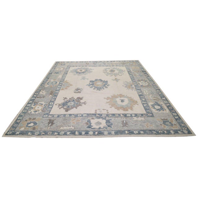 Hand-knotted with care using traditional rug-making techniques, this wool rug blends timeless craftsmanship with a modern...