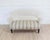 A beautiful antique French arch top sofa featuring an elegant curved back and refined carved detailing characteristic of...