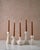 The Sculptural Quintet of Ceramic Candle Holders by Lostine is a handcrafted collection of five ceramic taper candle...