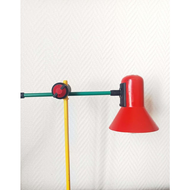 Iconic, multicolored lamp from the 1980s, made by the renowned Italian brand Veneta Lumi. In lacquered steel with primary...