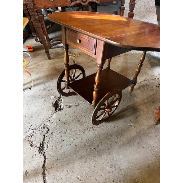 Victorian Butler Cart without any major damage or restoration needed. It is 20” wide without the sides up, and 40” wide with