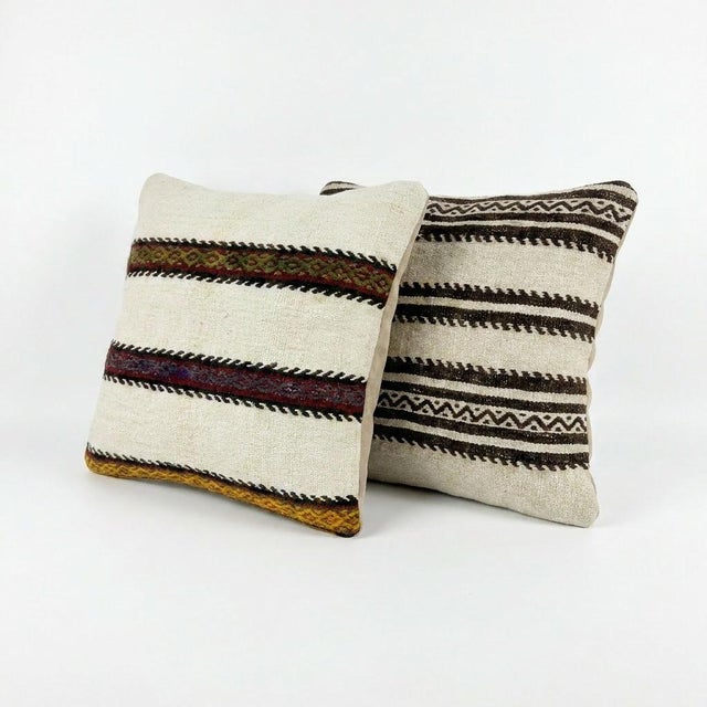This beautiful 20'' X 20'' pillow cover set was made from authentic Turkish Kilim pieces. Bright colors of wool adorn the...