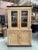 This old poplar and oak china cabinet has been fully restored. It comprises an upper section with 2 glass doors opening...
