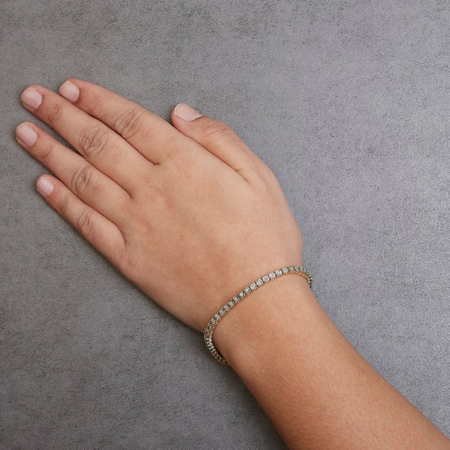 10K Yellow Gold Plated .925 Sterling Silver 1.0 Cttw Miracle-Set Diamond Round Faceted Bezel Tennis Bracelet (I-J Color, I3 Clarity) - 5" For Sale In New York - Image 6 of 7