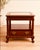 Bring timeless American craftsmanship into your home with this handsome matched pair of vintage Bassett end tables,...