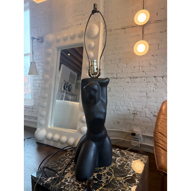 Vintage black ceramic figural table lamp base in a modernist, anthropomorphic style.