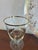 A charming vintage glassware set featuring a decorative “Happy Anniversary” plate paired with a coordinating goblet, both...