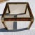 Stunning brass and lucite end or small coffee table with smoked glass inset in faux tortoiseshell, manner of Romeo Rega...