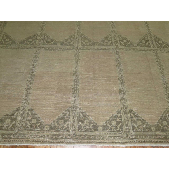 A rather large early 20th century Turkish Oushak with an all-over prayer niche motif design. 10' x 17'3''