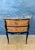 Elegant Louis XV style petite commode with marble top, dating to the mid-20th century. The chest features a serpentine...