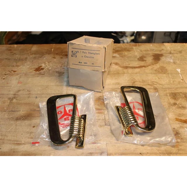 Ear-Shaped Handles in Solid Brass, 1950, Set of 2, in Very Good conditions. Designed 1950 to 1959 This piece has an...